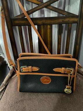 Dooney & Bourke Black Pebble Leather Crossbody with Tan Trim and Gold Hardware.